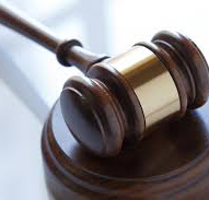 Gavel resting on atable
